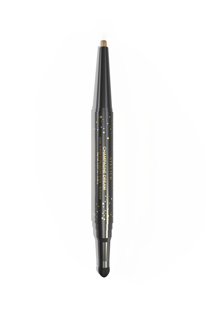 A dual-ended, twist-up eyeshadow pencil and sponge tip applicator in the shade, Champagne Dream, on a white background. 